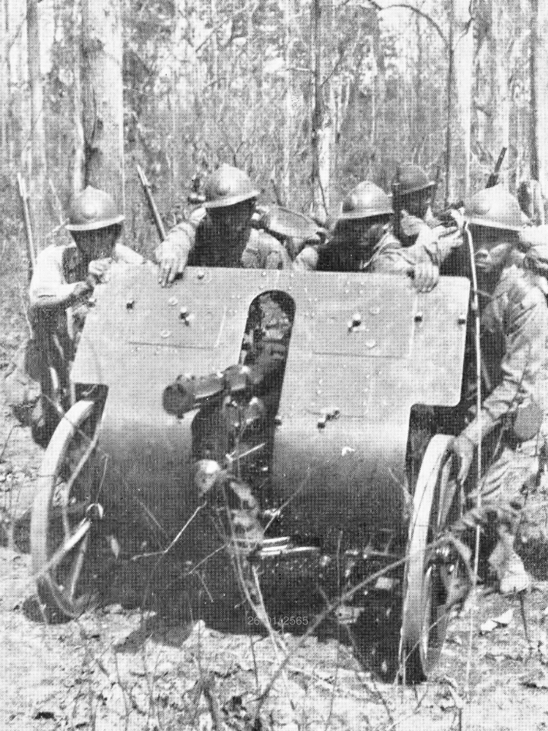 Thai Phayap army soldiers wearing Adrian helmets, carrying artillery in Burma. 
